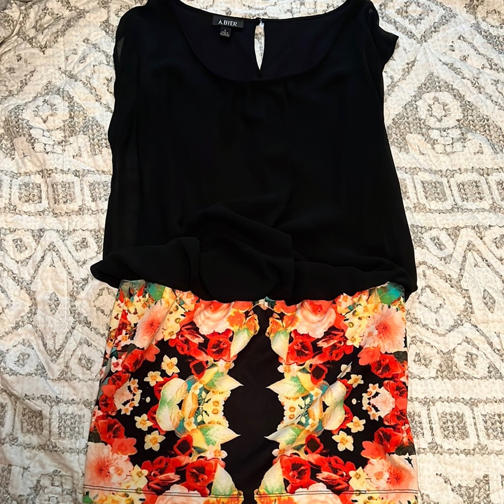 Looks like a skirt with a top, but it’s actually a dress